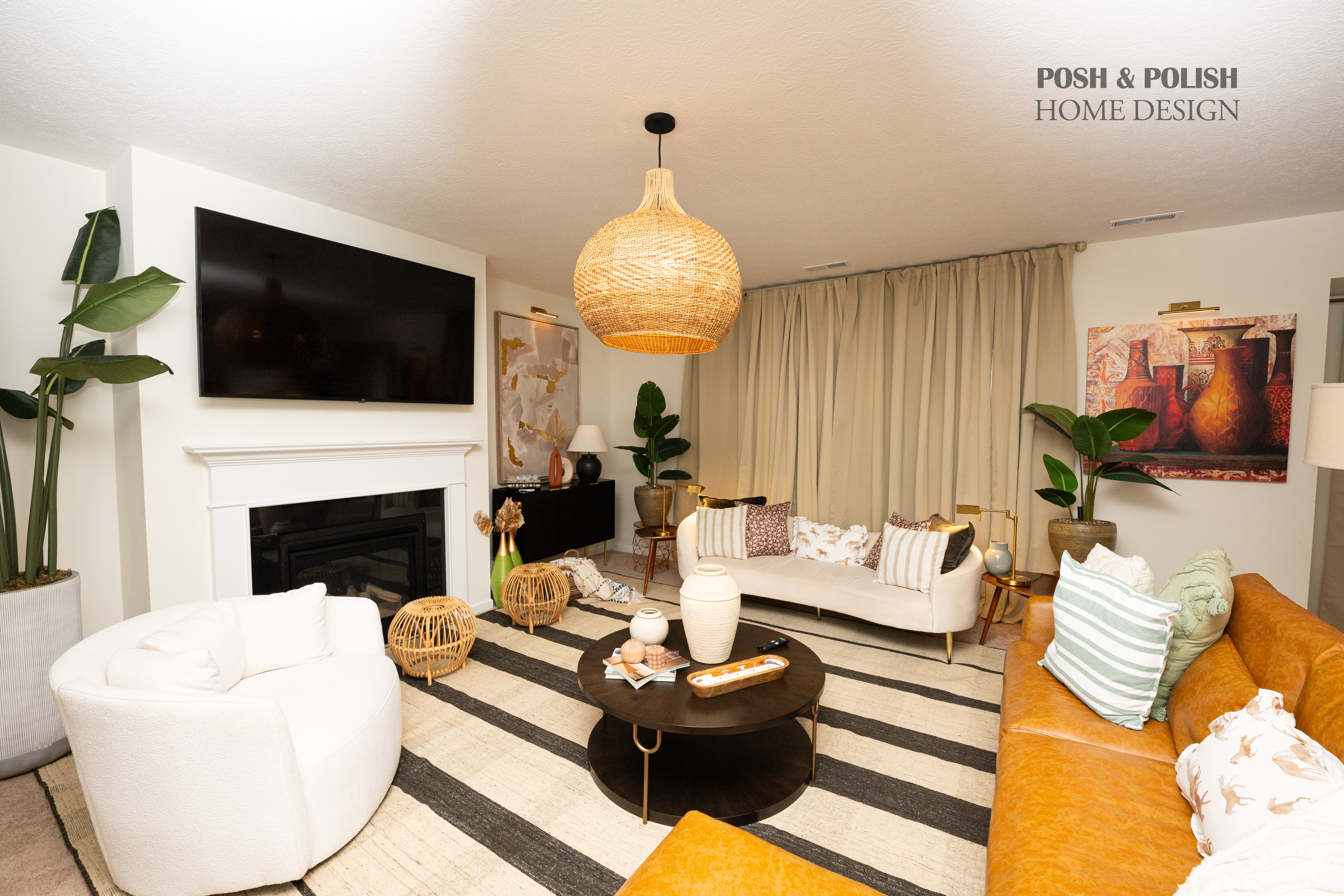 A stylish, minimalist living room with a neutral color palette, natural light, and modern furniture.